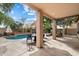 Inviting backyard oasis with a sparkling pool and patio at 7167 W Trails Dr, Glendale, AZ 85308