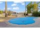 Residential in-ground pool with blue cover in backyard at 7329 N 16Th Ave, Phoenix, AZ 85021