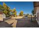 Large backyard with playset and open space for recreation at 7736 W Acoma Dr, Peoria, AZ 85381