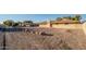 Front yard with gravel and large rocks at 7736 W Acoma Dr, Peoria, AZ 85381