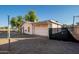 Detached garage with single door, offering ample storage space at 7736 W Acoma Dr, Peoria, AZ 85381