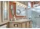 Bathroom features a large vanity and a walk-in shower at 7750 E Broadway Rd # 584, Mesa, AZ 85208