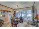 Bright dining area with round table and kitchen view at 7750 E Broadway Rd # 584, Mesa, AZ 85208