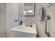 Simple bathroom with vanity, medicine cabinet, and grab bar at 7750 E Broadway Rd # 674, Mesa, AZ 85208