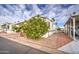 Landscaped yard with lush citrus tree and walkway at 7750 E Broadway Rd # 674, Mesa, AZ 85208