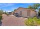 Backyard view showing a desert landscape with a home and storage shed at 8500 E Southern Ave # 509, Mesa, AZ 85209