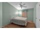 Cozy bedroom with wood flooring, ceiling fan, and neutral wall colors at 8500 E Southern Ave # 509, Mesa, AZ 85209