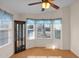 Bright dining area features bay window, wood floors, and built-in display cabinet at 8500 E Southern Ave # 509, Mesa, AZ 85209