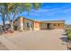 Front view of house with covered parking and desert landscaping at 8500 E Southern Ave # 509, Mesa, AZ 85209