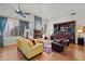 Bright living room with hardwood floors, fireplace and built-in shelving at 8760 N 73Rd Way, Scottsdale, AZ 85258