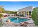 Inviting kidney-shaped pool with spa and ample patio space at 8760 N 73Rd Way, Scottsdale, AZ 85258