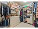 Large walk-in closet with ample shelving and hanging space at 8760 N 73Rd Way, Scottsdale, AZ 85258