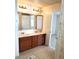 Bathroom with double vanity and tile flooring at 9655 E Edgewood Ave, Mesa, AZ 85208