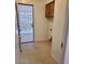 Laundry area with exterior access and cabinets at 9655 E Edgewood Ave, Mesa, AZ 85208