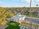 Aerial view showing a house with a large backyard, pool, and sports court at 9809 E Desert Cove Ave, Scottsdale, AZ 85260