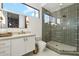 Modern bathroom with patterned tile shower and white vanity at 9809 E Desert Cove Ave, Scottsdale, AZ 85260