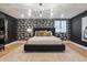 Elegant bedroom with patterned wallpaper and plush bedding at 9809 E Desert Cove Ave, Scottsdale, AZ 85260