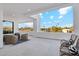 Spacious patio with wicker chairs and city views at 9809 E Desert Cove Ave, Scottsdale, AZ 85260