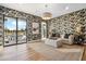 Relaxing sitting area with a view of the pool and stylish decor at 9809 E Desert Cove Ave, Scottsdale, AZ 85260