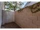 Private backyard with block wall and gate at 9880 E Pine Valley Rd, Scottsdale, AZ 85260