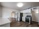 Modern kitchen with stainless steel appliances and white cabinets at 1022 S Lola Ln, Tempe, AZ 85281