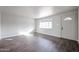 Bright living room featuring hardwood floors and lots of natural light at 1022 S Lola Ln, Tempe, AZ 85281