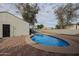 Inviting kidney-shaped pool in the backyard at 1022 S Lola Ln, Tempe, AZ 85281