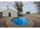 Inviting kidney-shaped pool in backyard at 1022 S Lola Ln, Tempe, AZ 85281