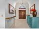 Bright and airy entryway with hardwood floors and decorative console at 10302 E Lotus Ct, Chandler, AZ 85248