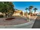 Front view of a house with a curved driveway and street view at 10302 E Lotus Ct, Chandler, AZ 85248