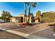 Single story home with double garage and mature landscaping at 10302 E Lotus Ct, Chandler, AZ 85248