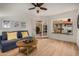 Bright living room with french doors leading to the backyard at 10302 E Lotus Ct, Chandler, AZ 85248