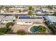 Aerial view showing home with pool, solar panels, and spacious backyard at 10517 W Diana Ave, Peoria, AZ 85345