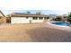 Backyard with a pool, gravel landscaping and solar panels at 10517 W Diana Ave, Peoria, AZ 85345