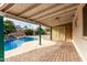 Relaxing covered patio overlooking the pool at 10517 W Diana Ave, Peoria, AZ 85345