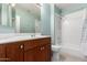 Bathroom with double vanity, shower, and tub at 11640 N Tatum Blvd # 2079, Phoenix, AZ 85028