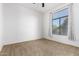 Spacious bedroom with neutral walls and carpeted floor at 11640 N Tatum Blvd # 2079, Phoenix, AZ 85028