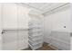 Large walk-in closet with shelving and storage bins at 11640 N Tatum Blvd # 2079, Phoenix, AZ 85028