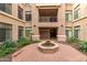 Elegant courtyard with fountain and brickwork at 11640 N Tatum Blvd # 2079, Phoenix, AZ 85028