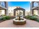 Octagonal fountain in a brick courtyard at 11640 N Tatum Blvd # 2079, Phoenix, AZ 85028