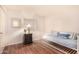 Bedroom with daybed, wood floors, and nightstand at 12017 N 27Th Pl, Phoenix, AZ 85028