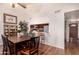 Dining area with wood table and kitchen passthrough at 12017 N 27Th Pl, Phoenix, AZ 85028