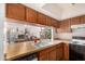 Kitchen features a pass-through to living room at 12017 N 27Th Pl, Phoenix, AZ 85028