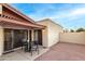 Small patio with table and chairs at 12017 N 27Th Pl, Phoenix, AZ 85028