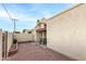 Private patio with gravel landscaping and small sitting area at 12017 N 27Th Pl, Phoenix, AZ 85028