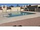 Community swimming pool with surrounding stonework at 12017 N 27Th Pl, Phoenix, AZ 85028