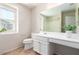 Bathroom with vanity, toilet and large mirror at 1333 N Balboa --, Mesa, AZ 85205