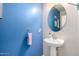 Powder room with pedestal sink and blue walls at 1333 N Balboa --, Mesa, AZ 85205