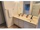 Double vanity bathroom with updated fixtures at 13383 W Ironwood St, Surprise, AZ 85374