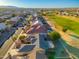 Aerial view showcasing a home's location in a golf course community at 13708 W Robertson Dr, Sun City West, AZ 85375